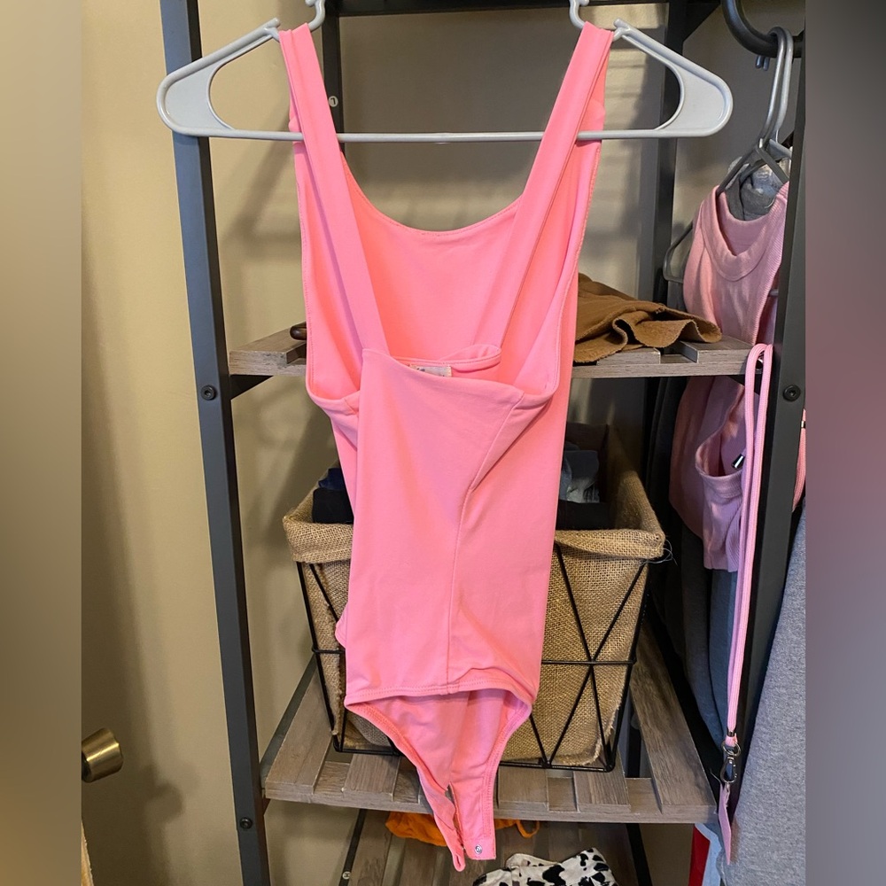 Pink body suit